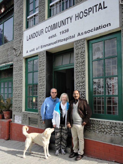 Bill, Joy and Dr. Clarence in front entrance of LCH 